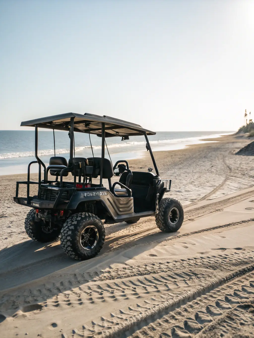 A picture of a golf cart adorned with beach gear, parked near the entrance of Rookery 3, highlighting the convenience of exploring the area.